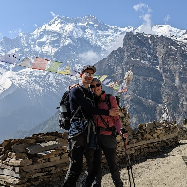 Profile Picture of Adrián Moreno (@zetxek), working side by side with a colleague: sitting on a desk, while looking at a screen